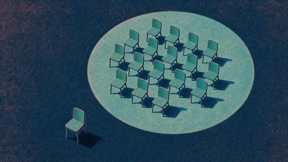 One chair reserved outside the light covering identical chairs.