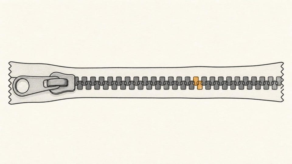 Minimal zipper with one displaced amber tooth exposing a reconciliation difference.