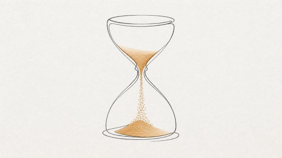 Open-necked hourglass with amber grains flowing freely and none trapped.