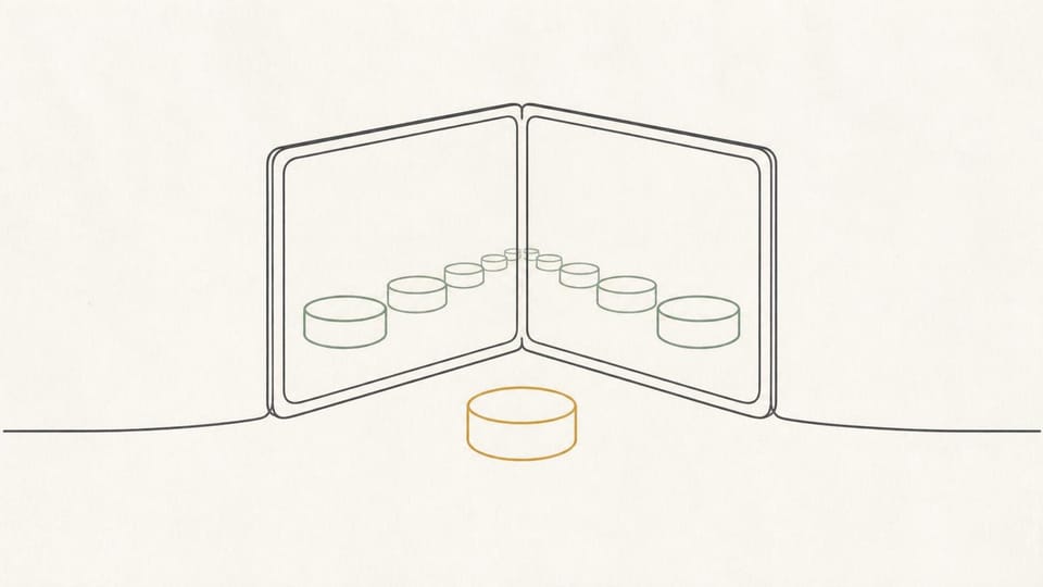 A single token multiplied by reflections in a folded mirror.
