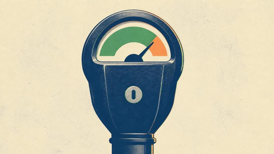 A mechanical meter showing a limited green allowance before an orange stop zone.