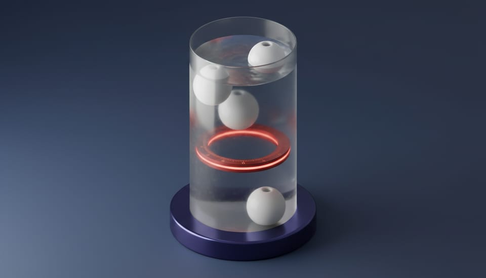 Three weighted porcelain floats suspended at different levels inside a vertical frosted glass liquid column.